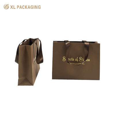 Αγορά XL Packaging Premium Gifting Experiences Brown Luxury Shopping Tote Bags Μεγάλες χαρτοσακούλες δώρων με λογότυπο Μινιμαλιστικό σχεδιασμό Τεχνητό φινίρισμα Πολυδιάστατο για τη μόδα ομορφιά Οικιακή διακόσμηση διαδικτυακή κατασκευή