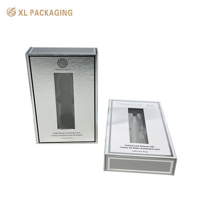 Προσαρμοσμένο λογότυπο Magnet Cosmetic Gift Box με ματ πλαστικοποίηση παράθυρο PVC και λευκό συρόμενο δίσκο για αντιγηραντική συσκευασία ορού